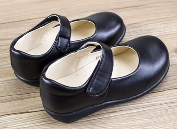 Plain black faux leather girls shoe